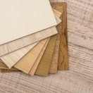 color-sample-boards-design-wooden-desk_359031-2543